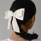 Lia Bow Hair Clip Hair Accessory mure + grand Beige 