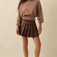 Lyra Pleated Vegan Leather Mini Skirt Clothing Promesa 