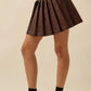 Lyra Pleated Vegan Leather Mini Skirt Clothing Promesa 
