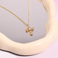 Aurelia Cross Necklace in White Necklaces mure + grand 