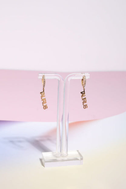 Taurus Crystal Zodiac Charm Dangle Earrings Earrings Mure + Grand Gold 